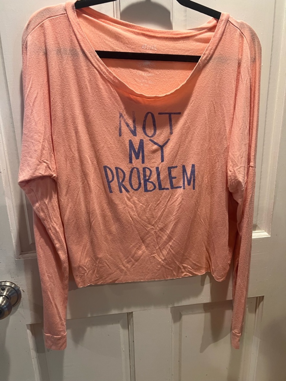 dELiA*s Peach Long Sleeve Graphic Tee - "Not My Problem"